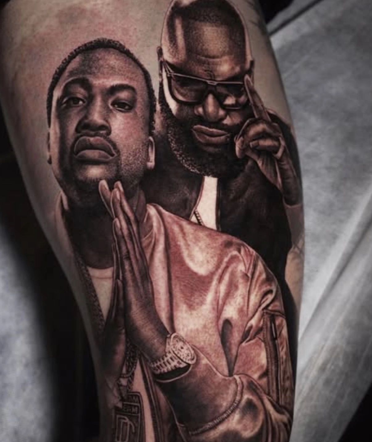 Portrait tattoo Melbourne masterpiece featuring detailed black and grey realism of hip hop artists